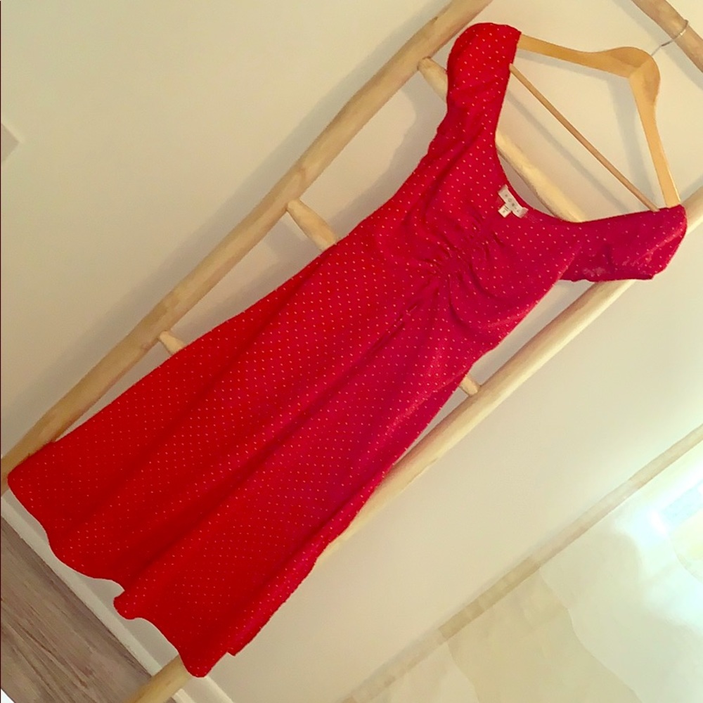 Bright red flowy polka dot dress